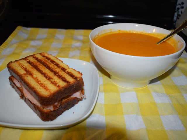 image of brioche panini with tomato soup