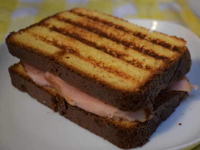 image of toasted ham and cheese on brioche