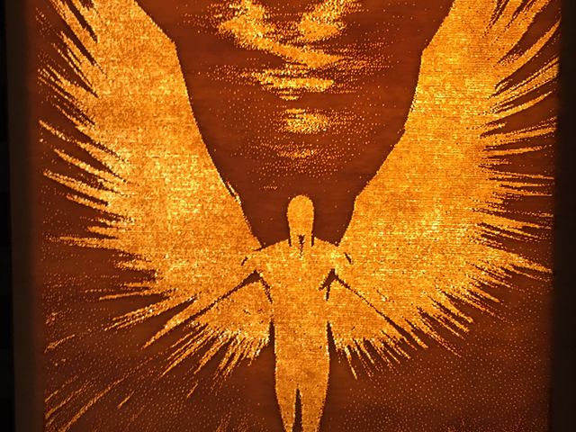 engraved angel lit from the back