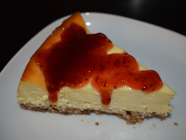 image of cheesecake with strawberry jam