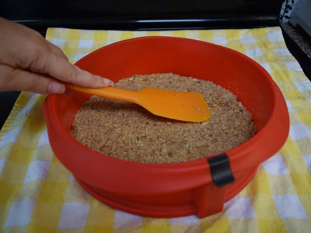 image of pressing crust into pan